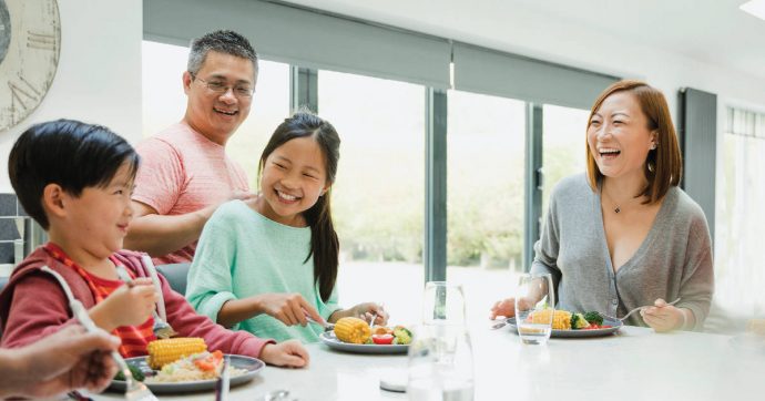 Family with two children at the dining table